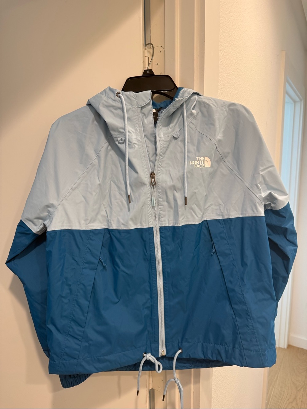 The North Face Men’s Two-Tone Light Blue and Teal Blue Windbreaker Jacket